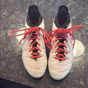 White and Red Athletic Shoes